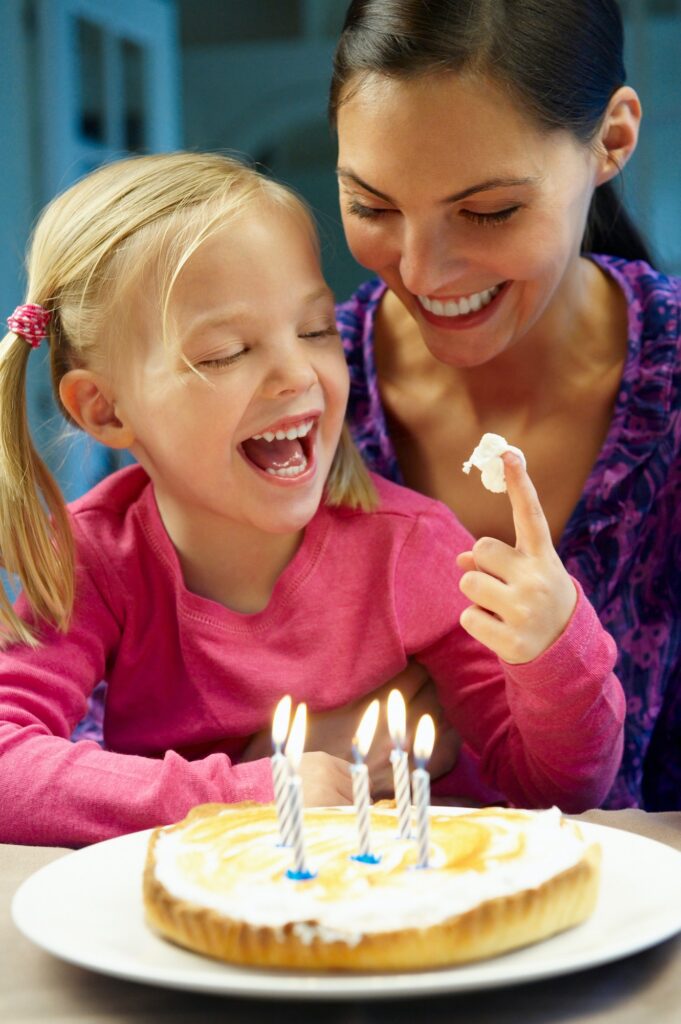 Mother and daughter celebrating birthday