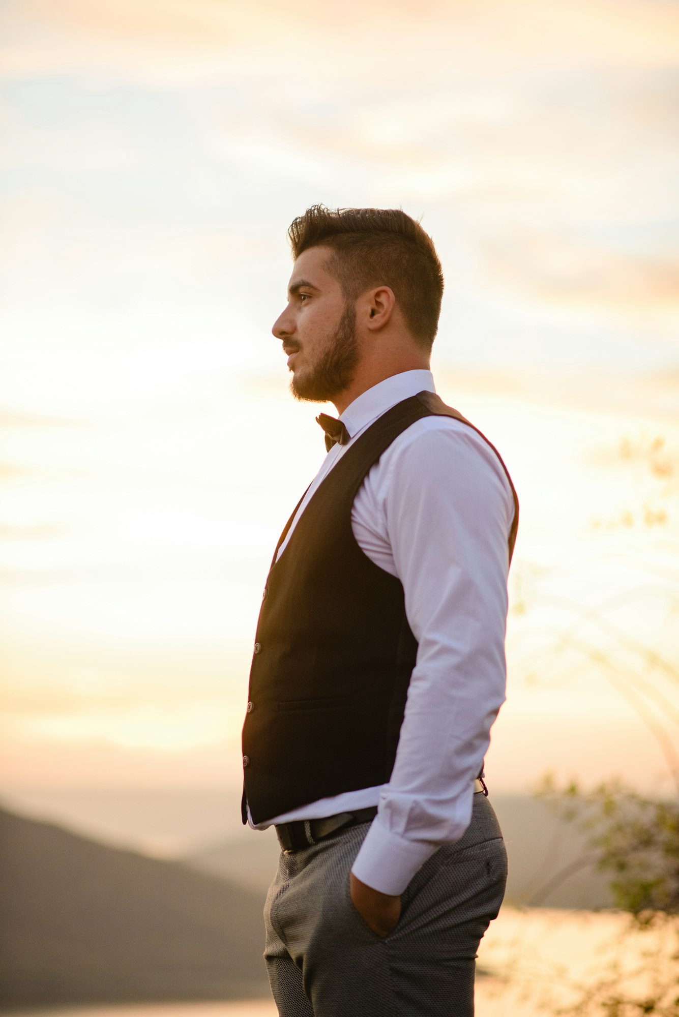 Portrait of the groom during sunset.